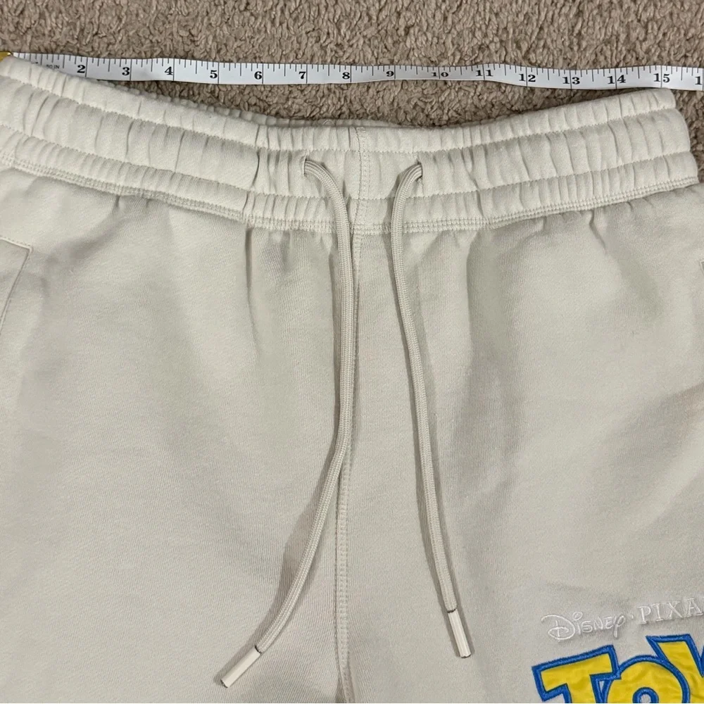 Disney Pixar Toy Story Sweatpants Mens Size M Joggers Woody‎ Buzz Rex Cream